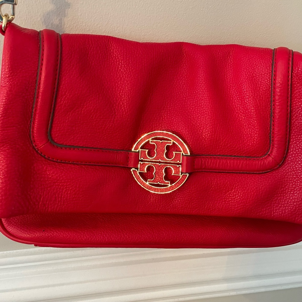 Tory Burch red crossbody bag. Can unclip to carry as a clutch